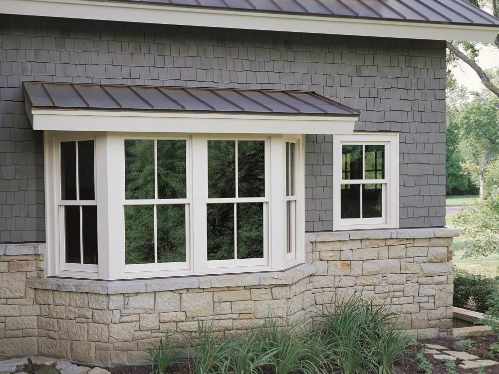 Outside view of a large living room bay window
