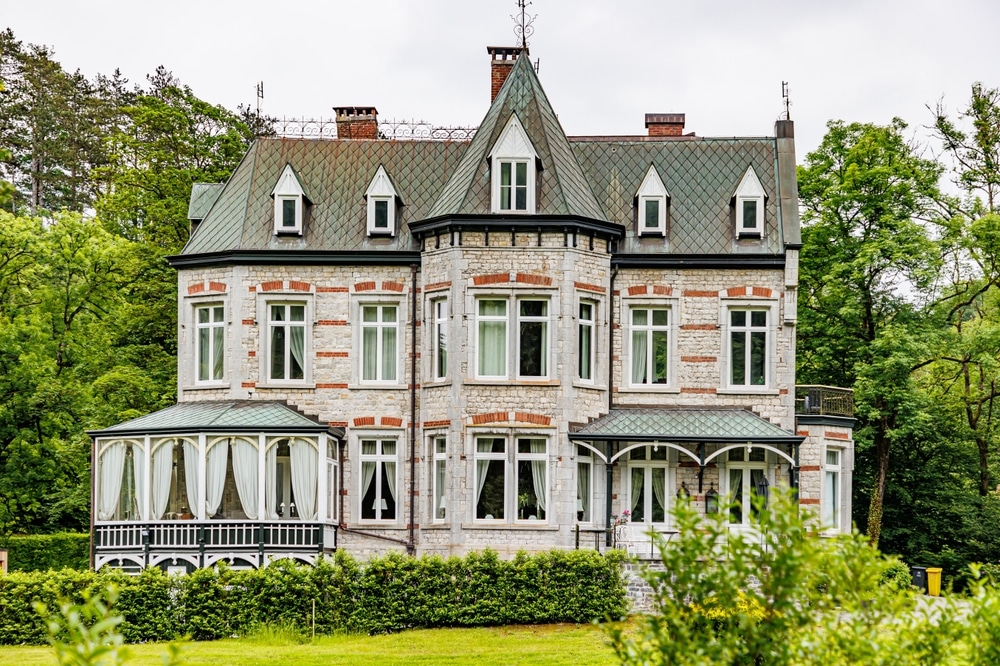 Exterior view of victorian home with casement windows