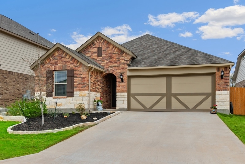 house exterior with wood window frames